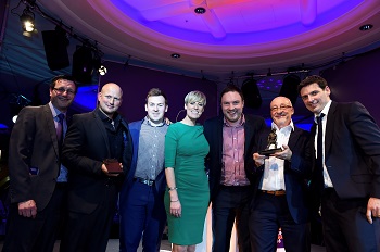 LIQUID GOLD AS TEAM SCOOPS ROOFING AWARD